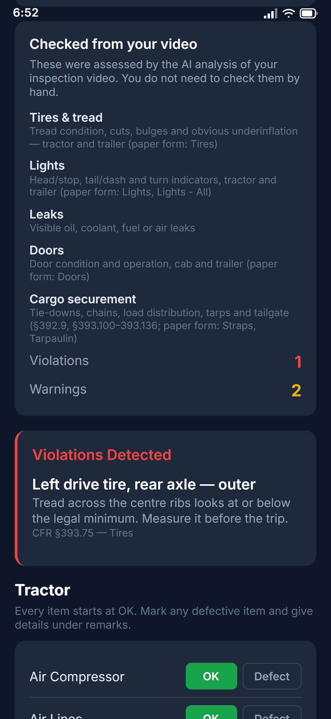 What the analysis returned, on the sign-off screen: the five categories checked from the video, one violation and two warnings, and the violation itself — a left drive tire at or below the tread limit, cited to 49 CFR §393.75.